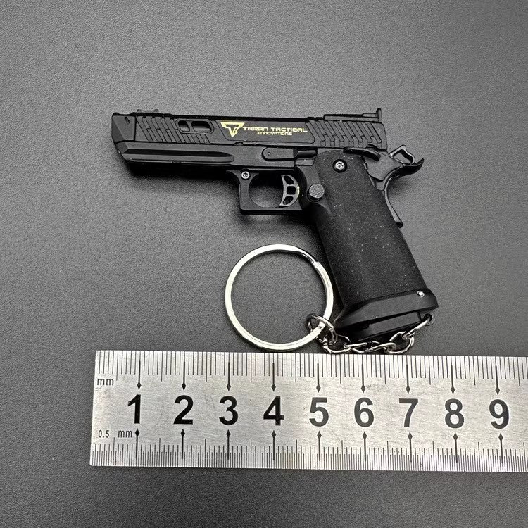 Mini Combat Master 2011 Shell Ejection Toy Gun Keychain - Image 7